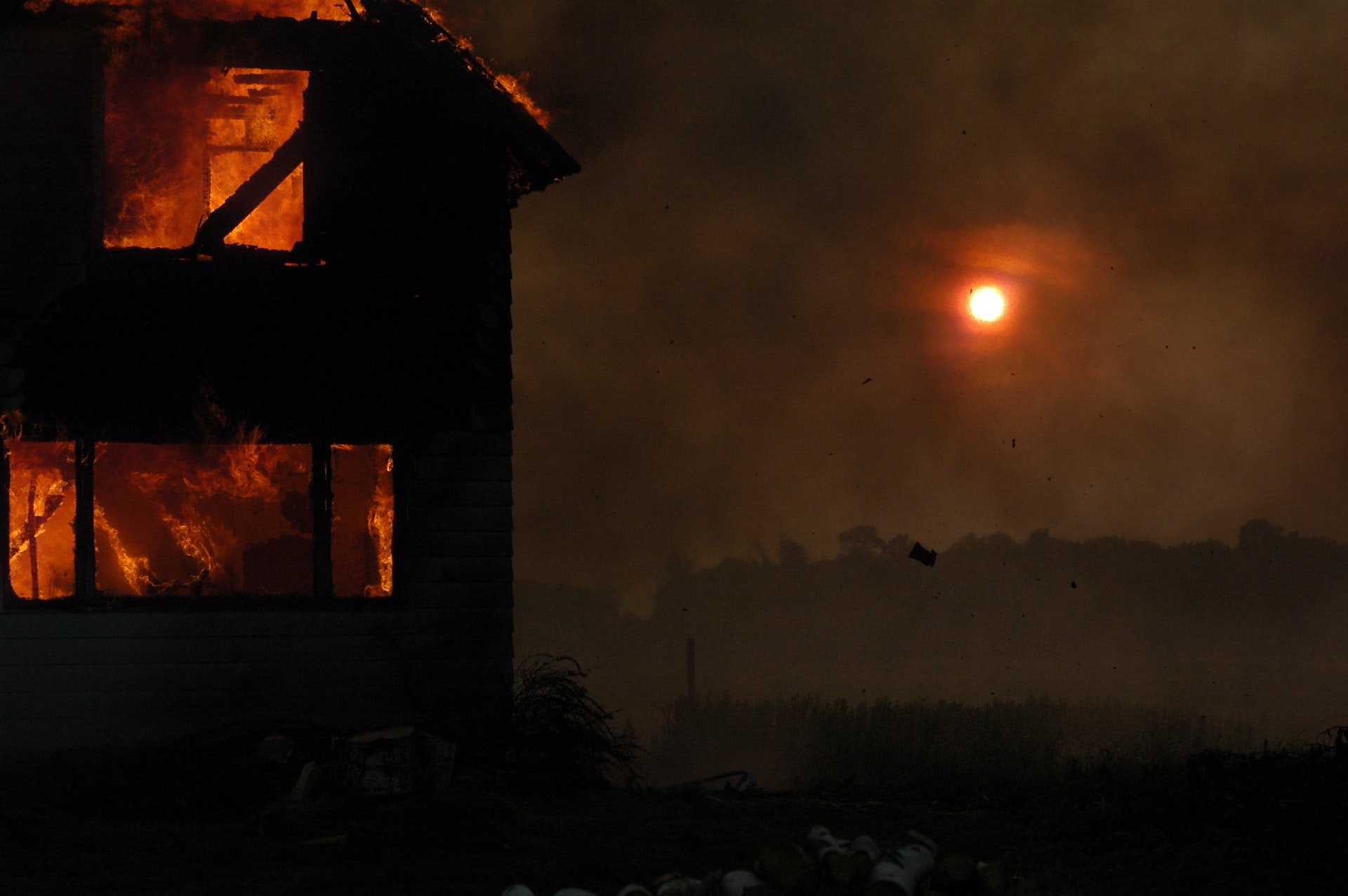 house on fire at night