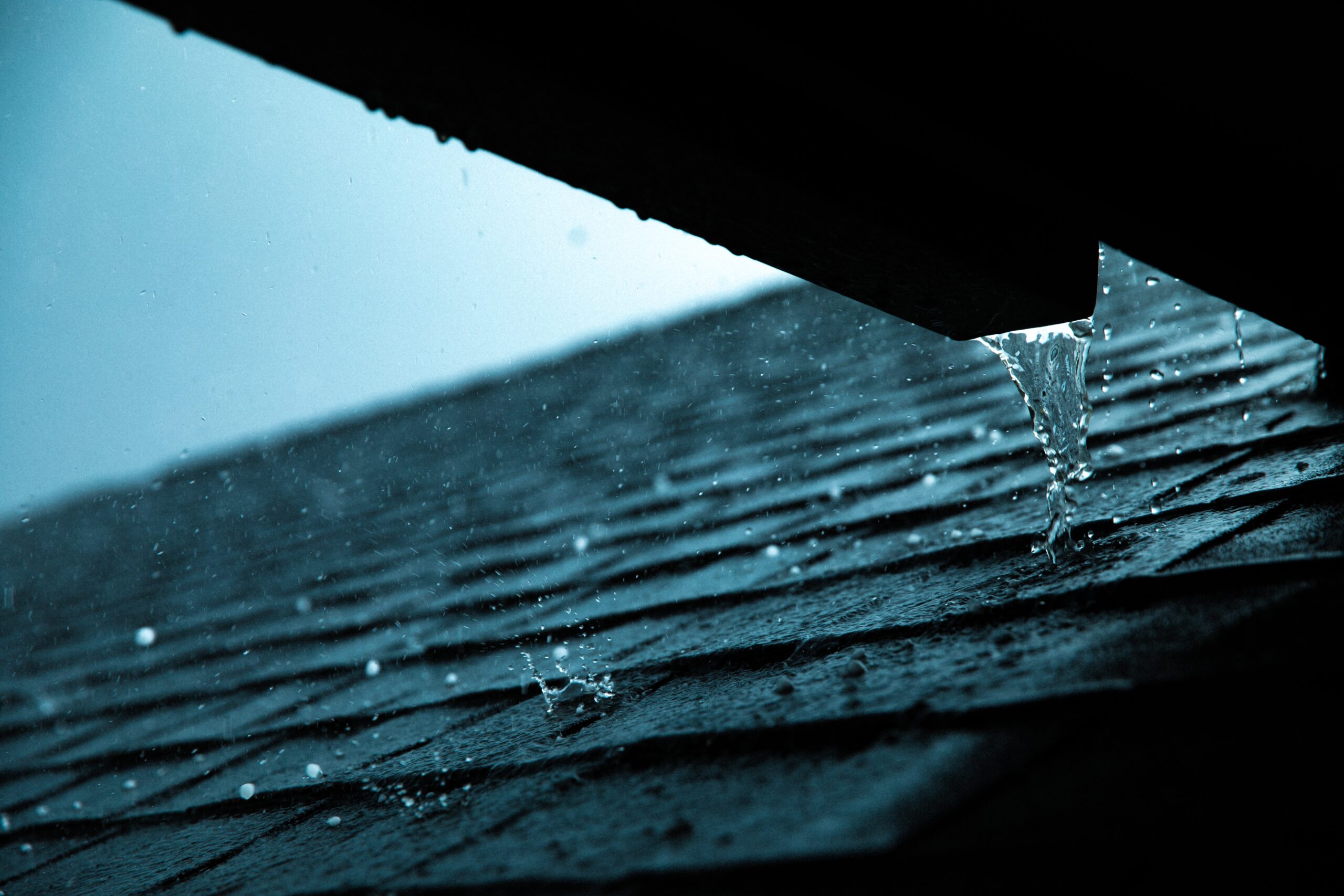 Hail + rain on roof of a house